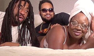 A Black Woman Sucks Two Big Black Cocks