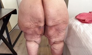 Fat grandmother opens juicy pussy