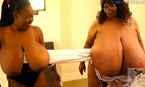 Two Very Phat Bitches Play With Their Gigantic Boobs