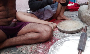 While cooking, the sister-in-law of the cows cooked on the stove and the sister-in-law while cooking