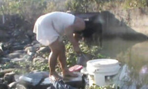 Bhabhi bathing in open space and fucked