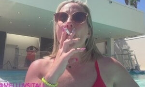 MILF Lights Up a Cigarette in a Vegas Pool With Everyone Watching