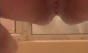 pissing in the shower - close up