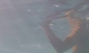Topless in a public pool - milf's tasty naturals underwater