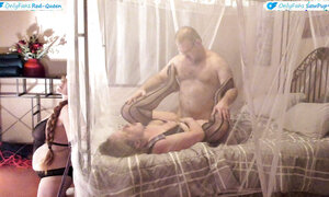 Cuckquean Wife Tied To Foot Of Bed While Husband Fucks Another Woman Behind Her (Side View)