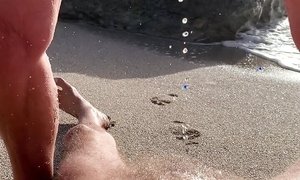 pissing on the beach