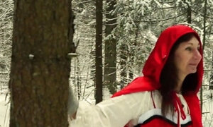 Red Hood in the snowy forest