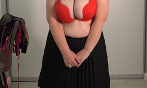 Mature wife chooses a bra for work. Big gorgeous boobs bounce and pop out of bras. Saggy tits.