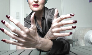 Long Dark Red Fingernails and Fist Hand