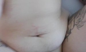 'Tattooed Curvy Milf with Glasses and Big Tits fucked hard in Bed POV'