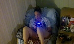 Step mom smoking cigarette and playing video games in her bra and panties (Part 2)