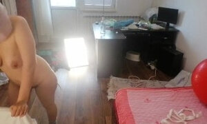 Sexy wife has fun trying on clothes and cutting them. Brunette dances naked around the house.