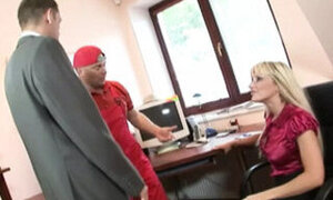 In the workplace, a horny blonde engages in sexual intercourse with both her boss and the maintenance guy.