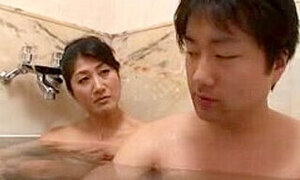 Breasty milf gets a creampie in a free Japanese porn