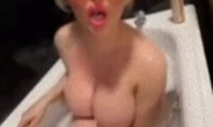 In the  Bath after I've been fuked hard with carpet burns on my legs , big titted bimbo pornstar