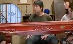 A charming mom japonse seduced young man