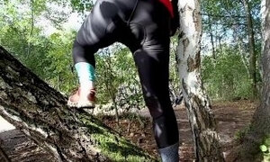 I'm pissing in the woods during a bike ride