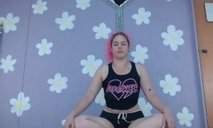 Cute MILF does yoga in tiny shorts